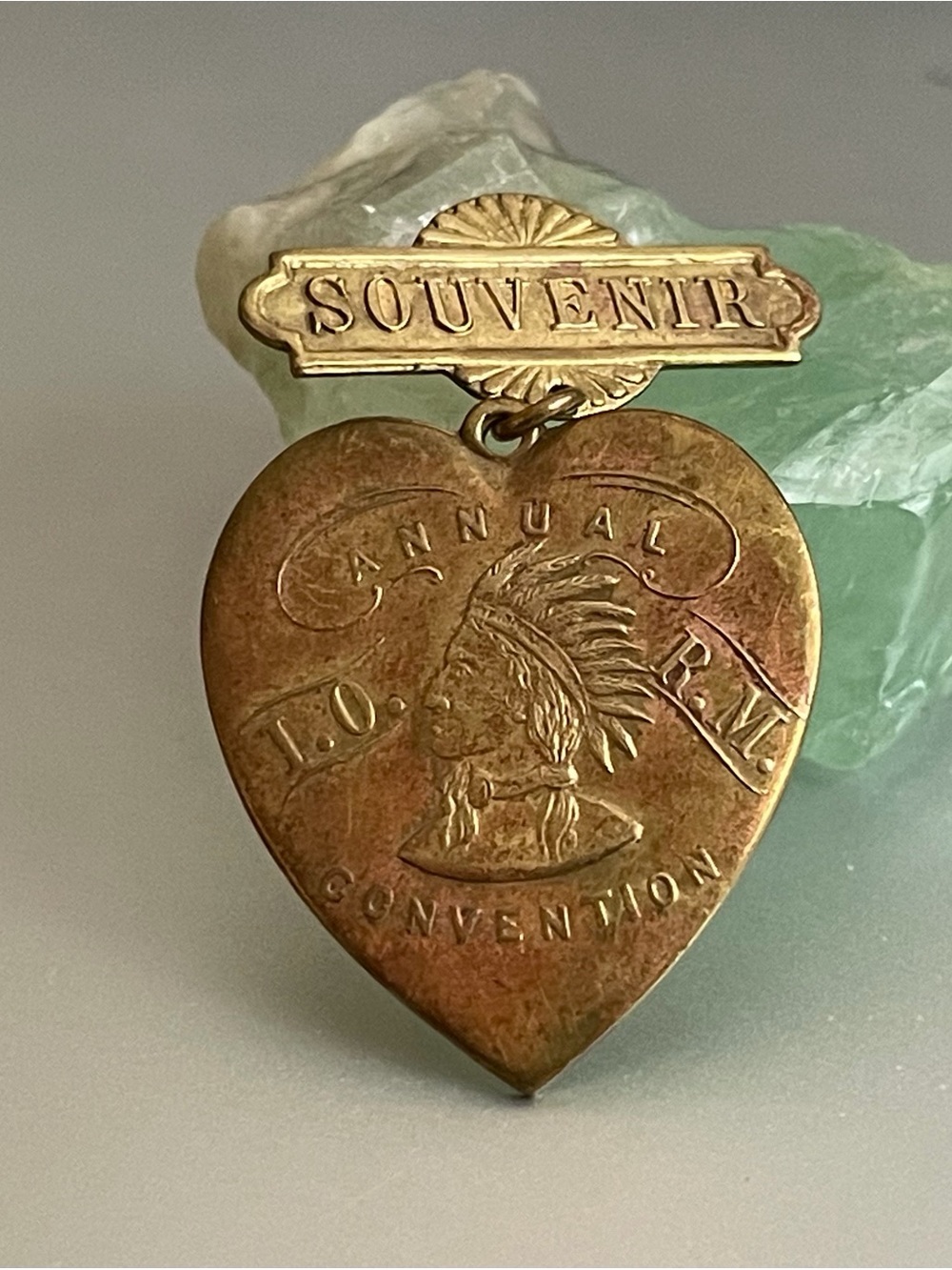 Antique Brooch  Heart Drop the profile of a Native American chief.